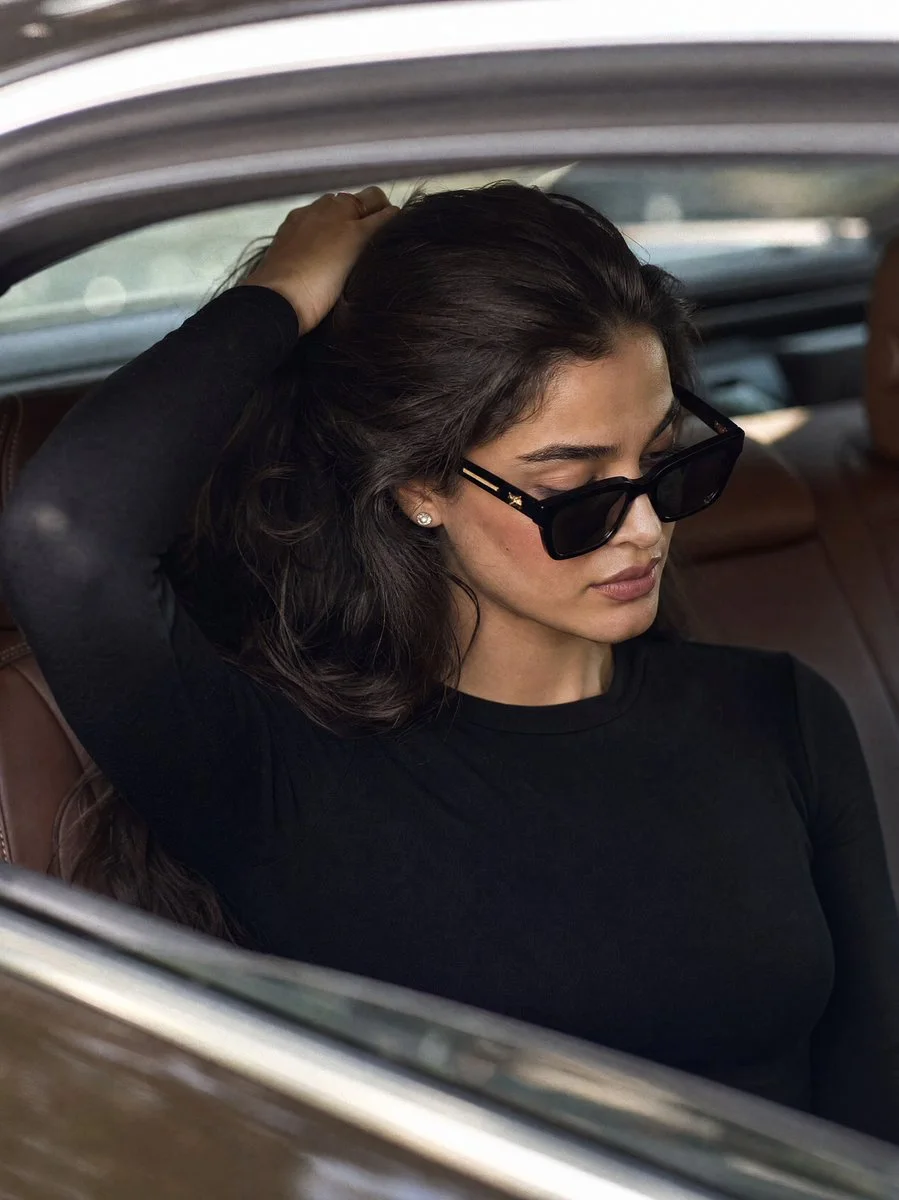 A quiet-luxury editorial portrait variation with old-money elegance and shallow depth of field.
